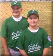 Two people in baseball uniforms